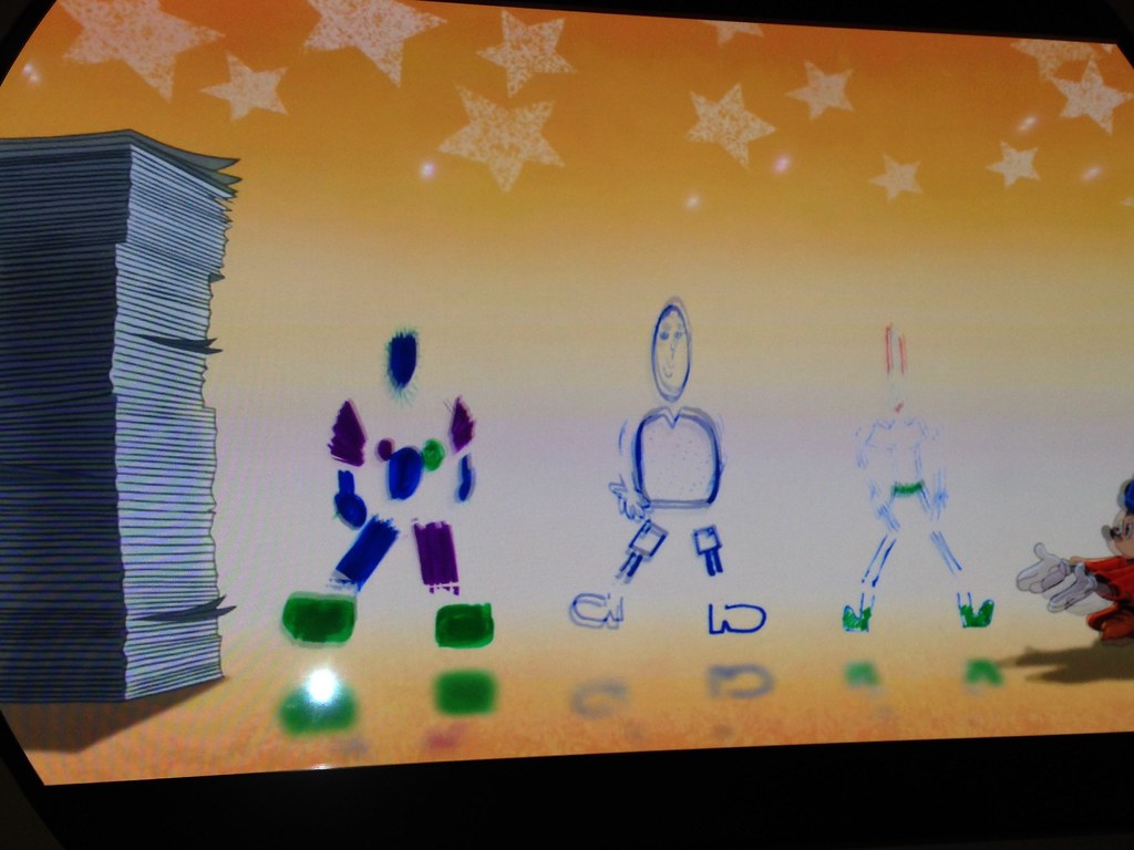 Animated drawings appearing on a wall display inside Animator's Palate on Disney Fantasy