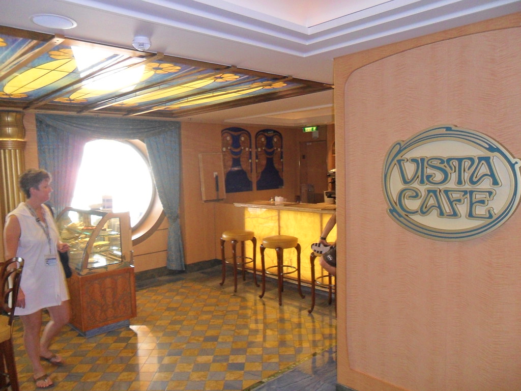 Vista Cafe counter and sign overlooking the atrium on Disney Fantasy