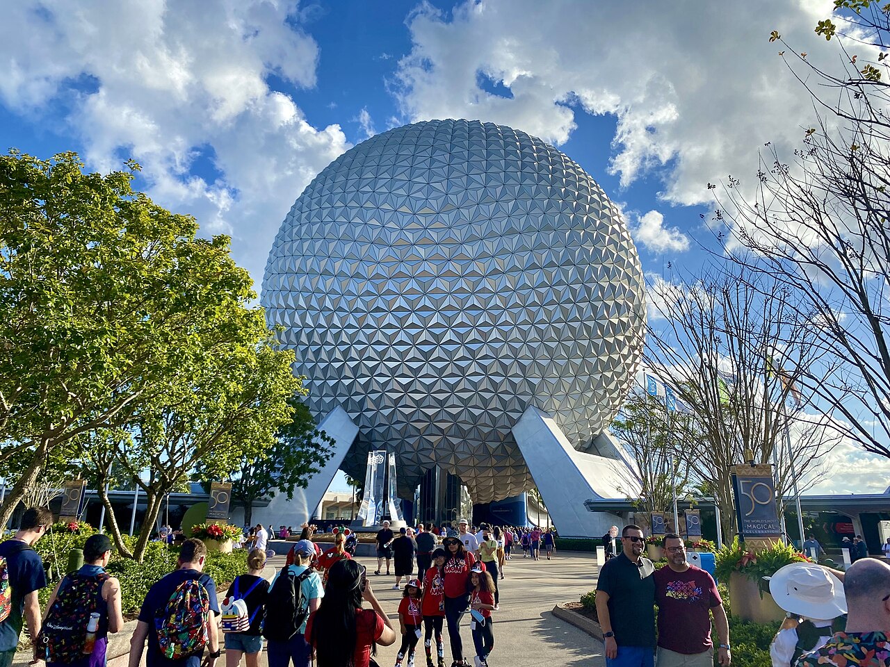 Spaceship Earth rising above EPCOT's entrance plaza and fountain
